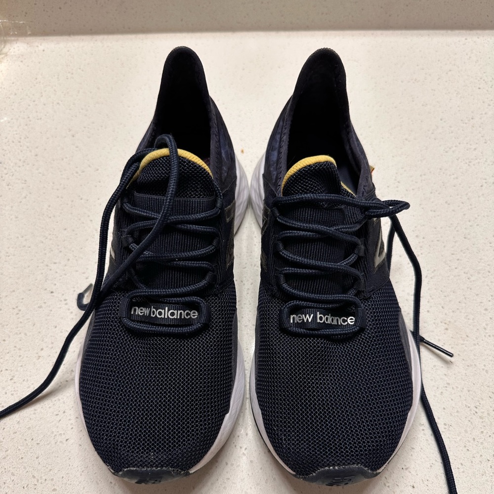 Selling a pair of size 7 navy new balance.